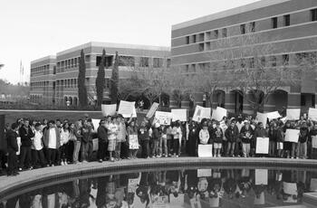 Forms of Solidarity project, featuring ASU Enrollment Services photo of a student march in honor of Martin Luther King, Jr.